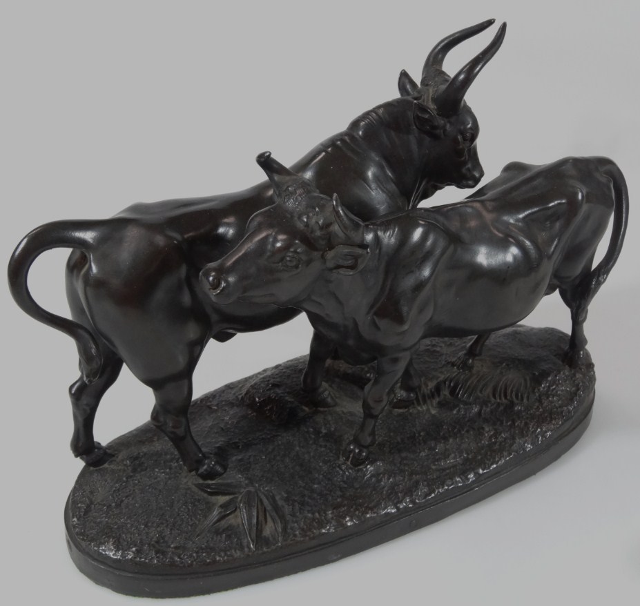 Appraisal: After Loseau Bull and cow standing on naturalistic oval base