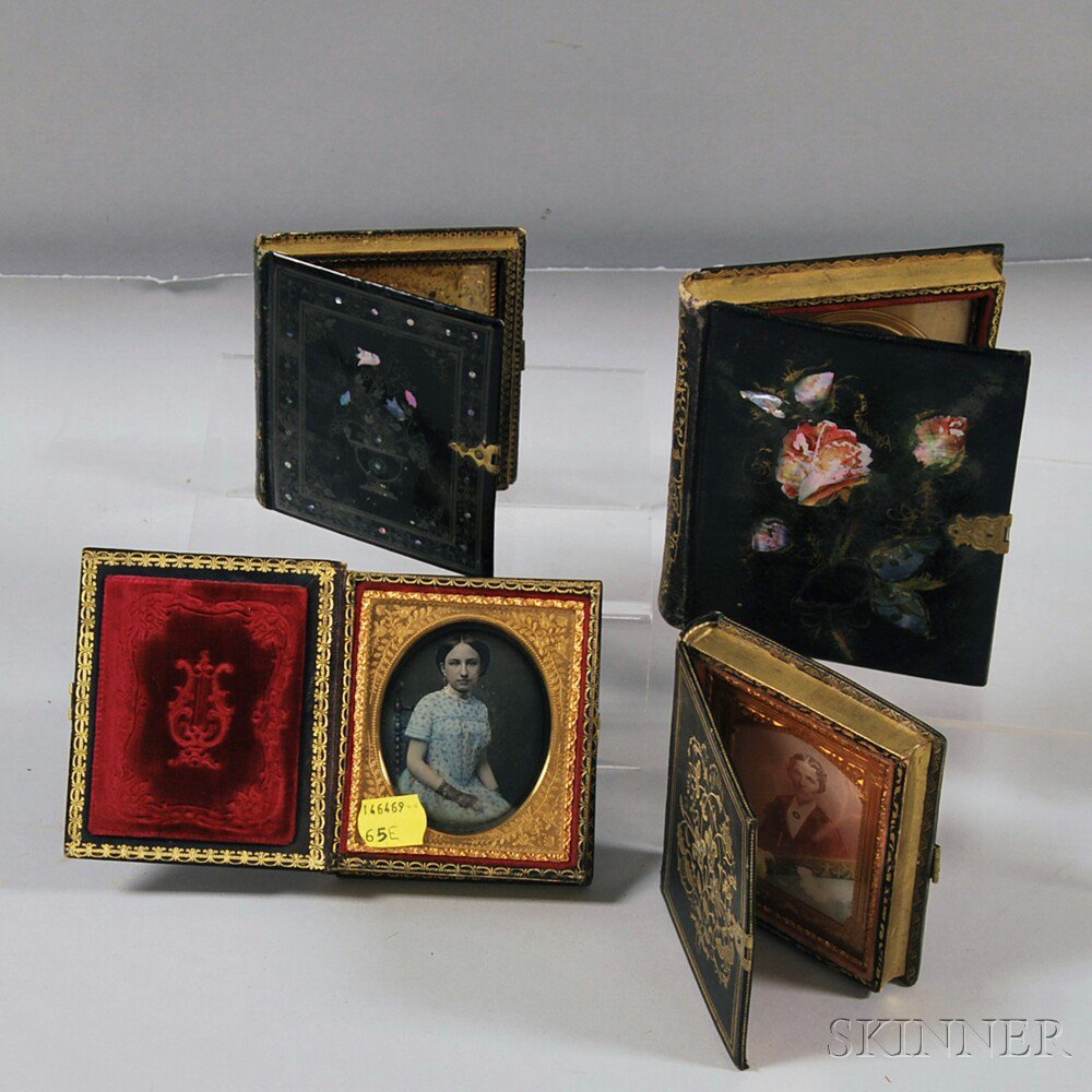 Appraisal: Four Daguerreotype Portraits in Abalone-inlaid Lacquer and Album-type Cases a