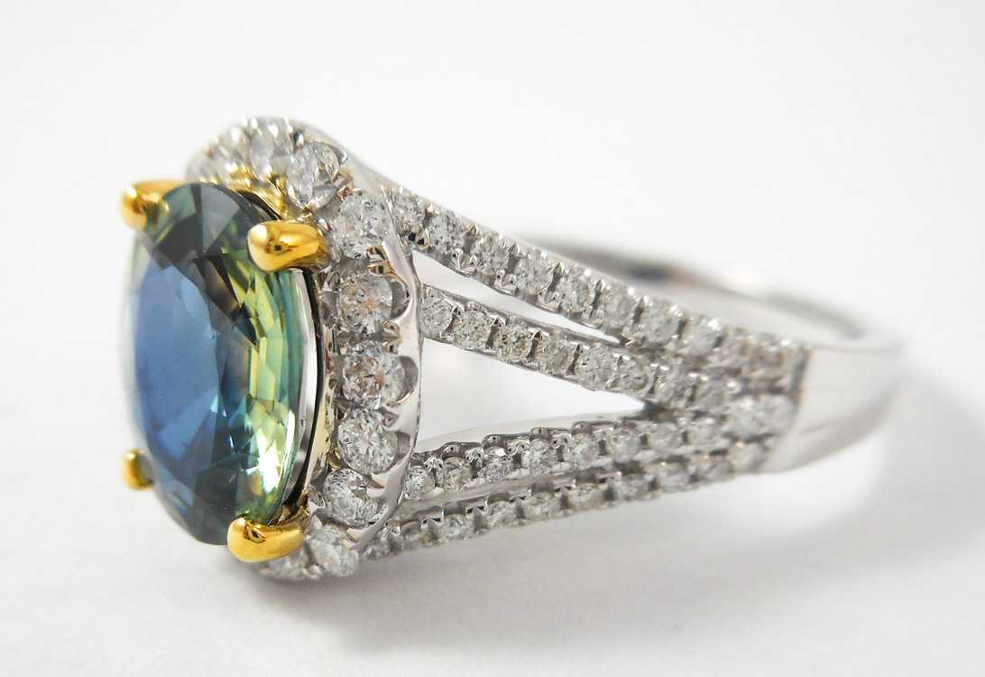 Appraisal: GREEN SAPPHIRE AND FOURTEEN KARAT GOLD RING The white and