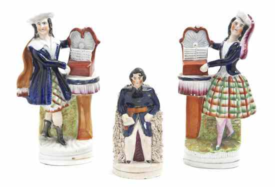 Appraisal: A Pair of Staffordshire Figures depicting a gentleman and a