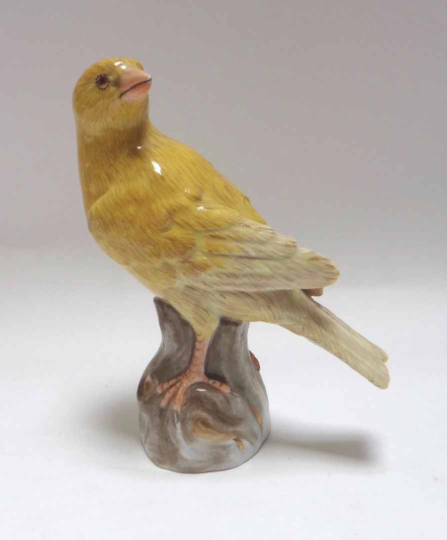 Appraisal: A Meissen porcelain canary circa modelled atop a naturalistic base