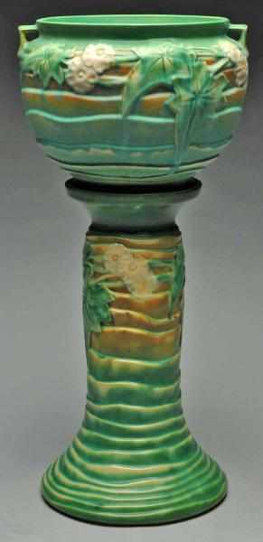 Appraisal: Roseville Luffa Green Jardiniere Pedestal Description Blue green ribbed background