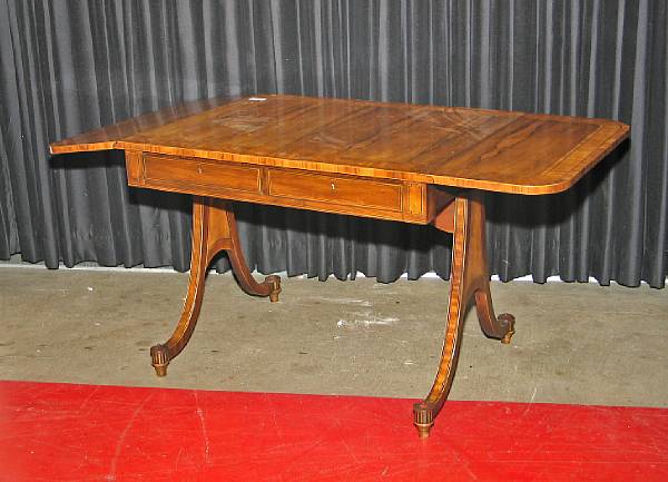 Appraisal: A Regency style inlaid rosewood sofa table mid th century