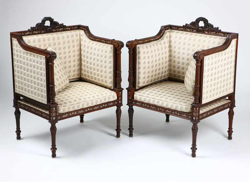 Appraisal: A pair of Victorian brass and mother-of-pearl-inlaid rosewood bergeres Late