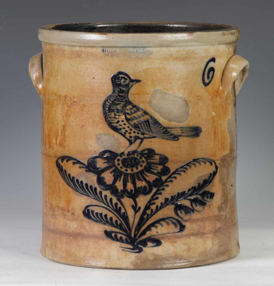 Appraisal: John Burger Gallon Crock With bird on flower decoration Condition