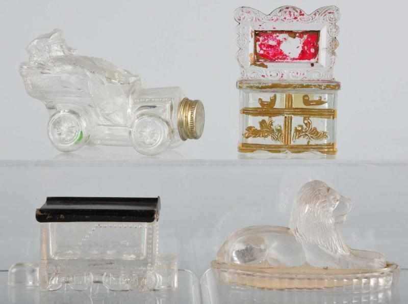 Appraisal: Lot of Glass Candy Containers Description Includes one sitting lion