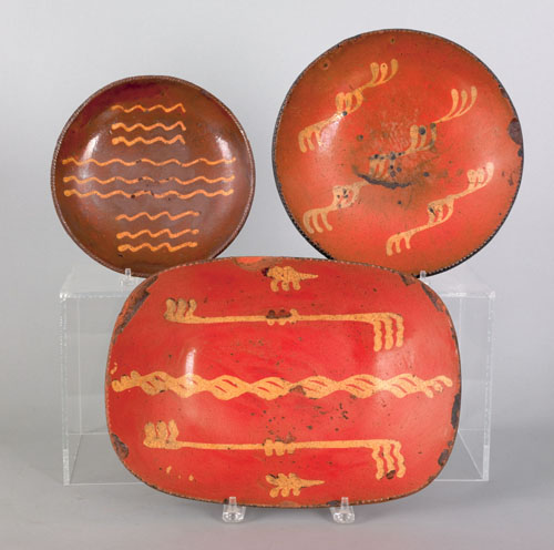 Appraisal: Redware loaf dish together with two pie plates th c