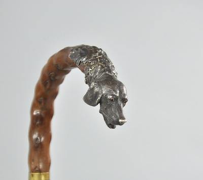 Appraisal: A Silver Dog Head Walking Stick Made of wood stick