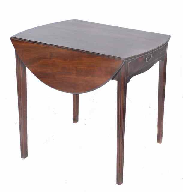 Appraisal: A TH CENTURY MAHOGANY OVAL PEMBROKE TABLE standing on reeded