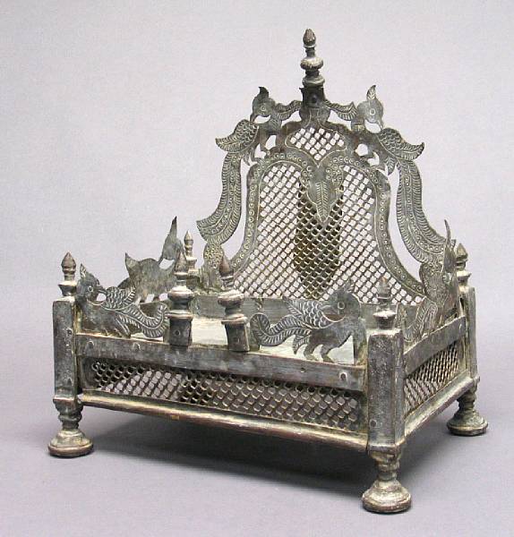 Appraisal: An Indian pieced copper footed tray With cut-work bird decoration