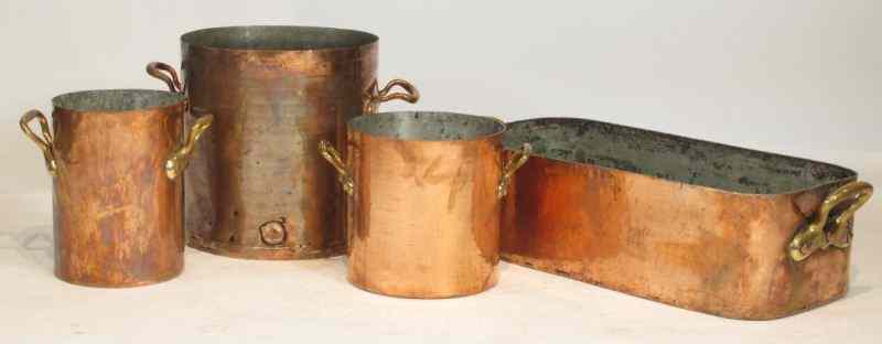 Appraisal: Four Large Antique Copper Potsincluding cylindrical copper pot with double