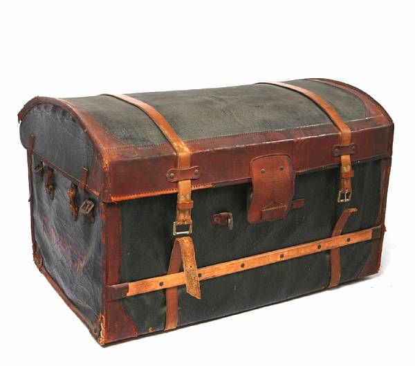 Appraisal: A painted leather dome top trunk with later smoke glass