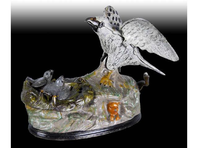 Appraisal: Cast Iron Eagle Eaglets Mechanical Bank Description Gray J E