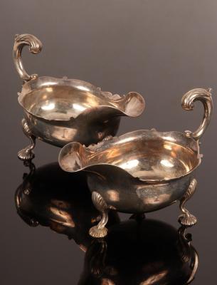 Appraisal: A pair of George II silver sauce boats Robert Innes