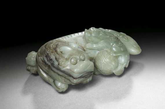 Appraisal: FO-DOG WITH TWO PUPS China th century H cm L