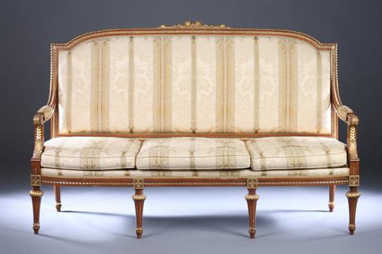 Appraisal: LOUIS XVI STYLE PARCEL-GILT CANAPE late th century Flower-head carved