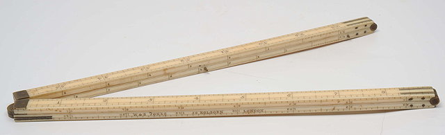 Appraisal: A TH CENTURY IVORY FOLDING RULE inches long closed signed