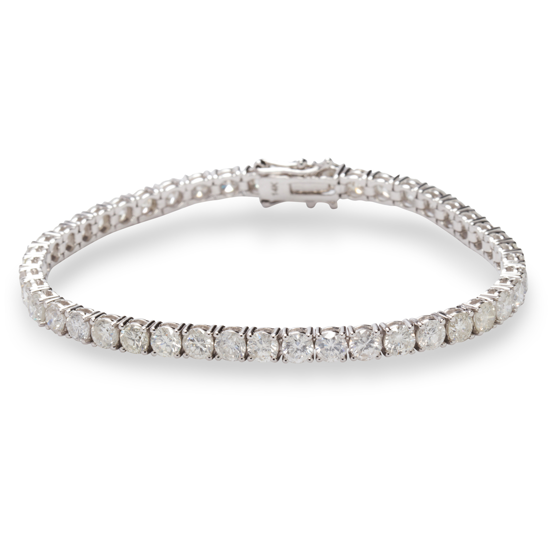 Appraisal: A DIAMOND AND FOURTEEN KARAT WHITE GOLD BRACELET A diamond