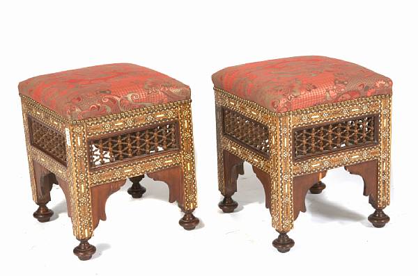 Appraisal: A pair of Moorish style inlaid and upholstered stools height