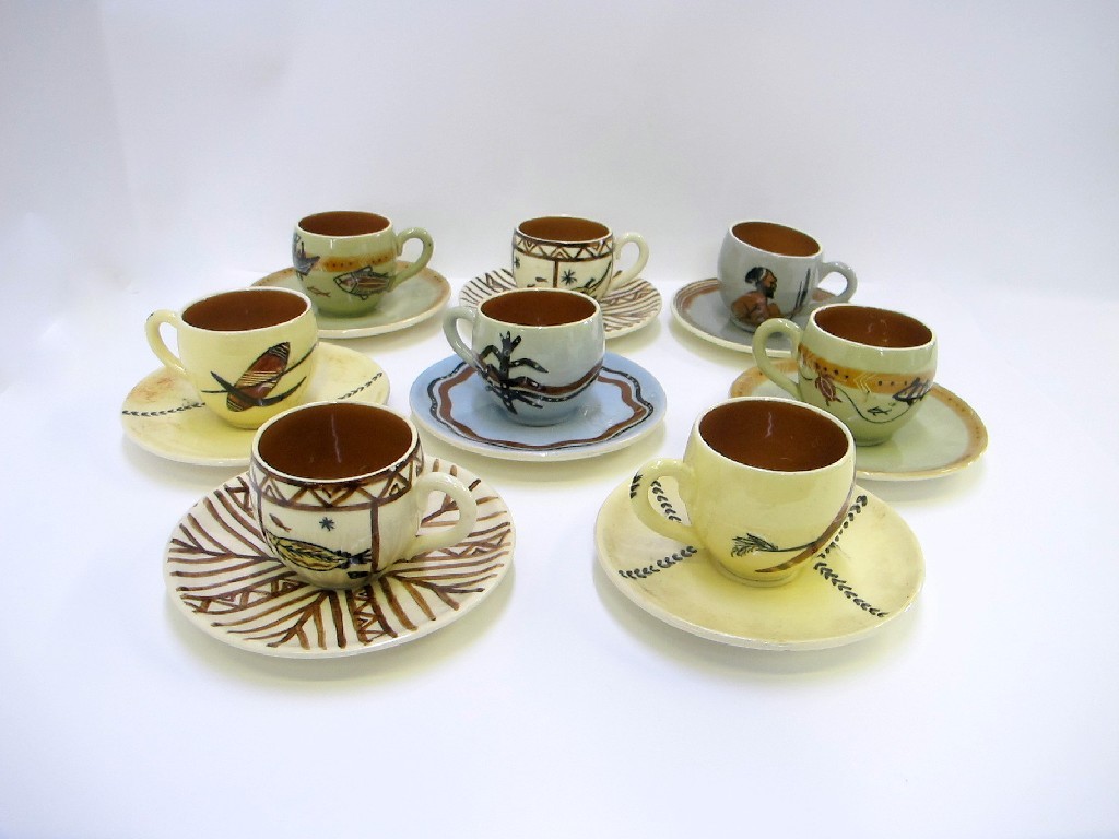 Appraisal: Eight Martin Boyd cups and saucers each decorated with aboriginal