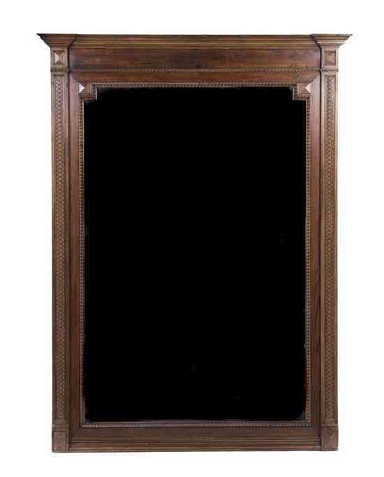 Appraisal: A Continental Pine Console Mirror having a block front molded