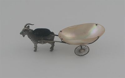 Appraisal: A goat pulling a mother of pearl cart by Adie