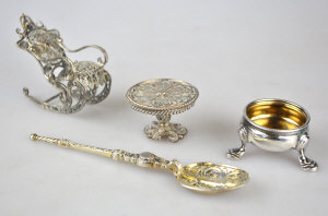 Appraisal: A filigree miniature rocking chair and tripod table to w