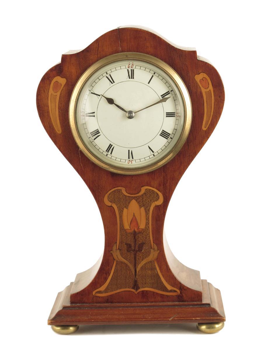 Appraisal: A mahogany and marquetry mantel timepiece