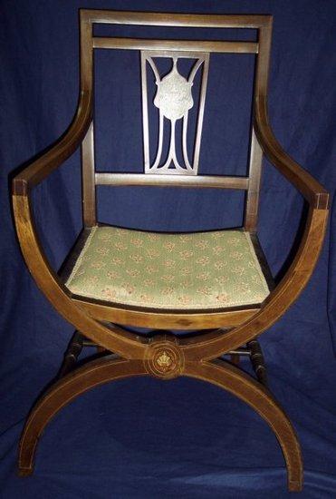 Appraisal: An Edwardian inlaid open armchair on an X-shaped support