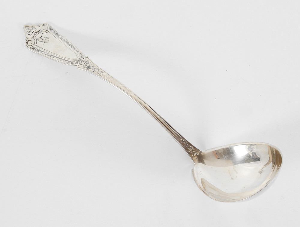 Appraisal: LARGE STERLING LADLE Handle with devil masqueron and foliate motifs