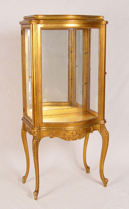 Appraisal: GILT FRENCH VITRINE DISPLAY CABINET Bow front center glass sides