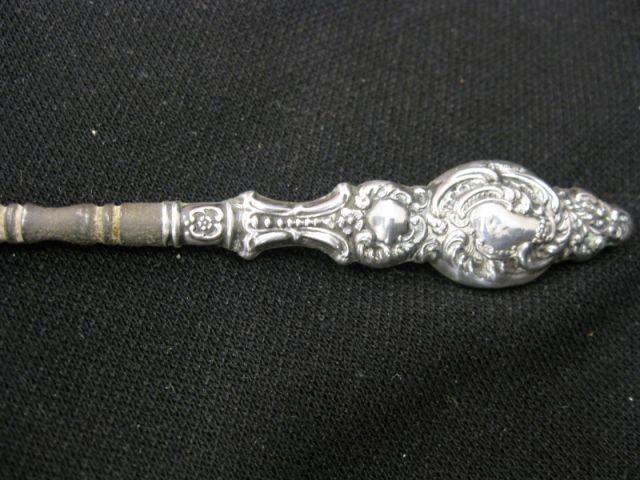 Appraisal: Victorian Sterling Button Hook elaborate handle long