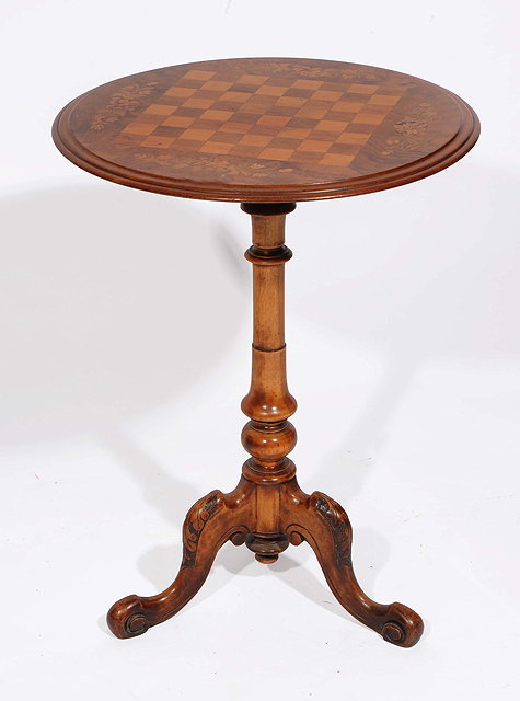 Appraisal: A VICTORIAN WALNUT CIRCULAR CHESS TABLE with floral inlay to