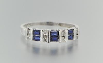 Appraisal: A Platinum Diamond and Sapphire Band Platinum ring set with