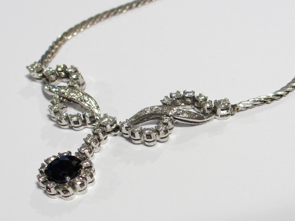 Appraisal: A sapphire and diamond necklace of entwined bow design set