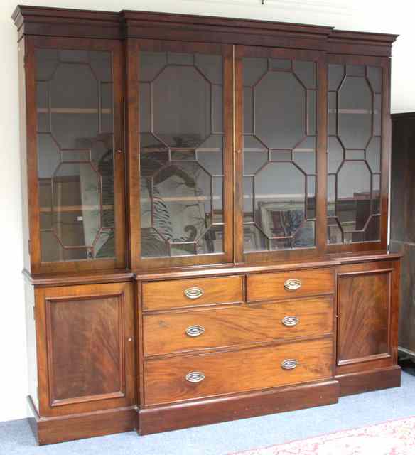 Appraisal: A th Century mahogany library bookcase of breakfront form the