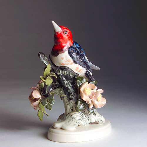 Appraisal: Rare STANGL porcelain single Red-Headed Woodpecker Repairs to several leaves