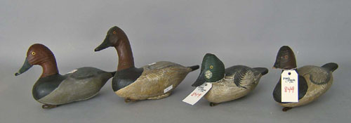 Appraisal: Four carved and painted decoys stamped Bryant