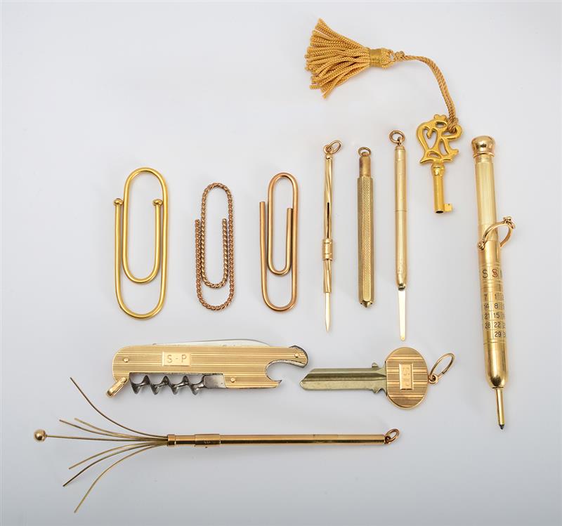 Appraisal: GROUP OF GOLD ACCESSORIES Comprising three pens two keys a