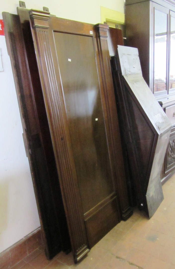 Appraisal: A th century mahogany hall cupboard the architectural cornice over