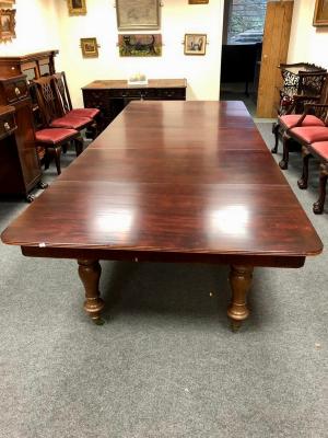 Appraisal: A Victorian mahogany extending dining table fitted three extra leaves