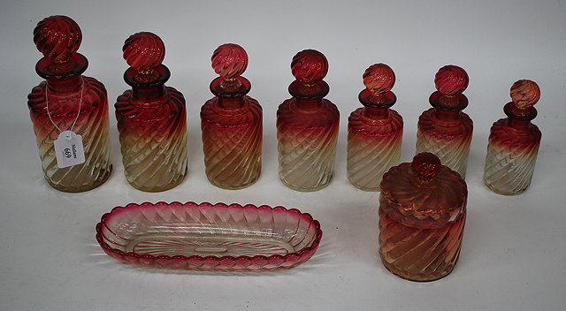 Appraisal: A GROUP OF MOULDED BACCARAT PERFUME BOTTLES of cable twist