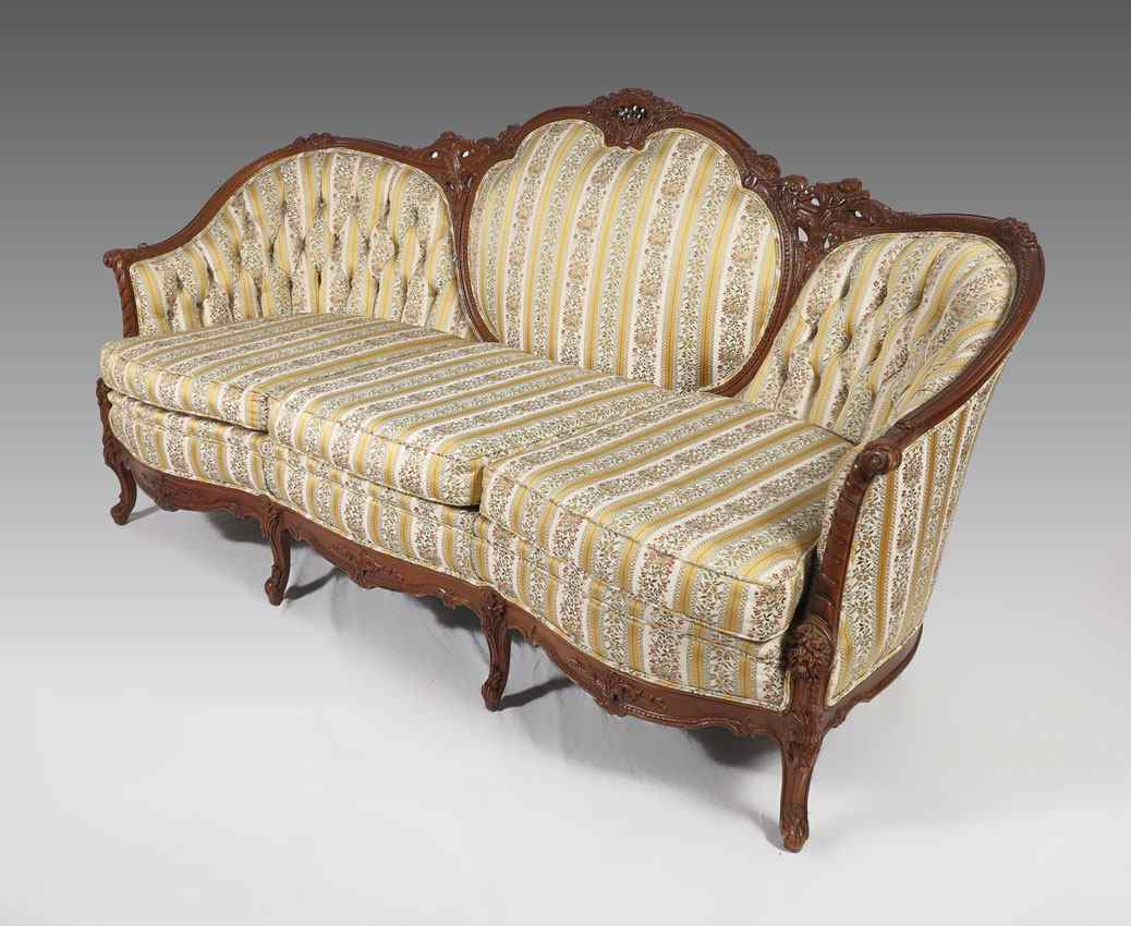 Appraisal: WALNUT FRENCH STYLE CARVED SOFA Early th C medallion back