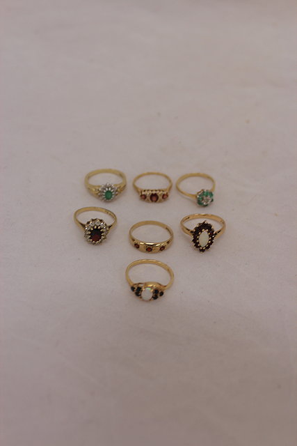 Appraisal: A NINE CARAT GOLD EMERALD AND DIAMOND SET RING a