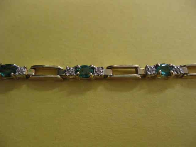 Appraisal: Emerald Diamond Bracelet rich oval gems with diamonds on each