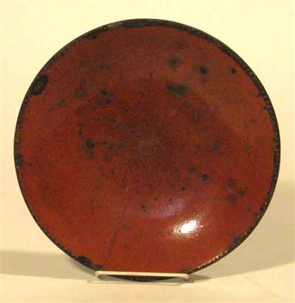 Appraisal: Redware plate pennsylvania th century With crimped edge Dia in