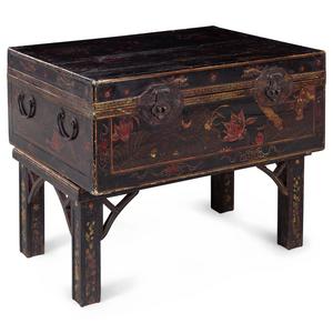 Appraisal: A Chinese Lacquered Trunk th Century raised on an associated