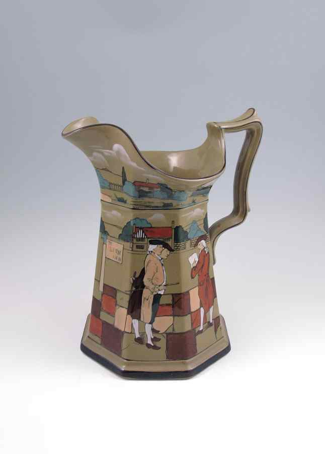 Appraisal: BUFFALO POTTERY DELDARE WARE PITCHER Scene from ''Ye Old English