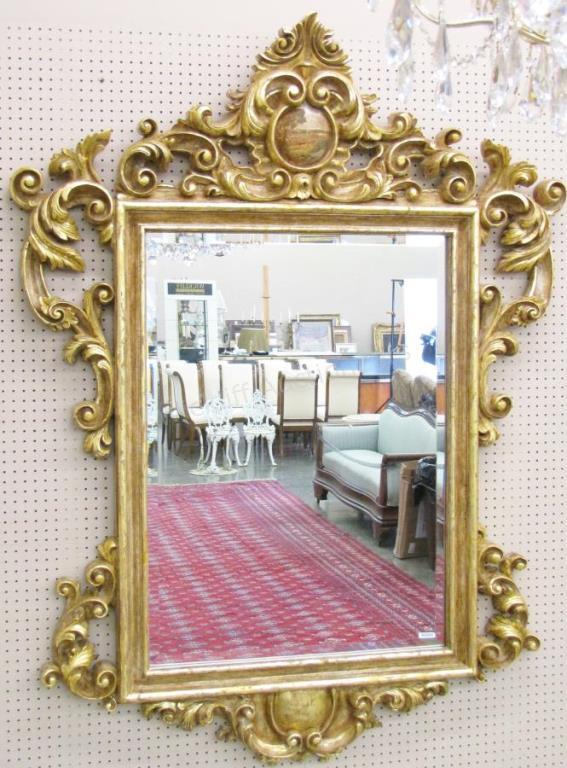 Appraisal: A large French style gilt-finished and molded frame decorator wall