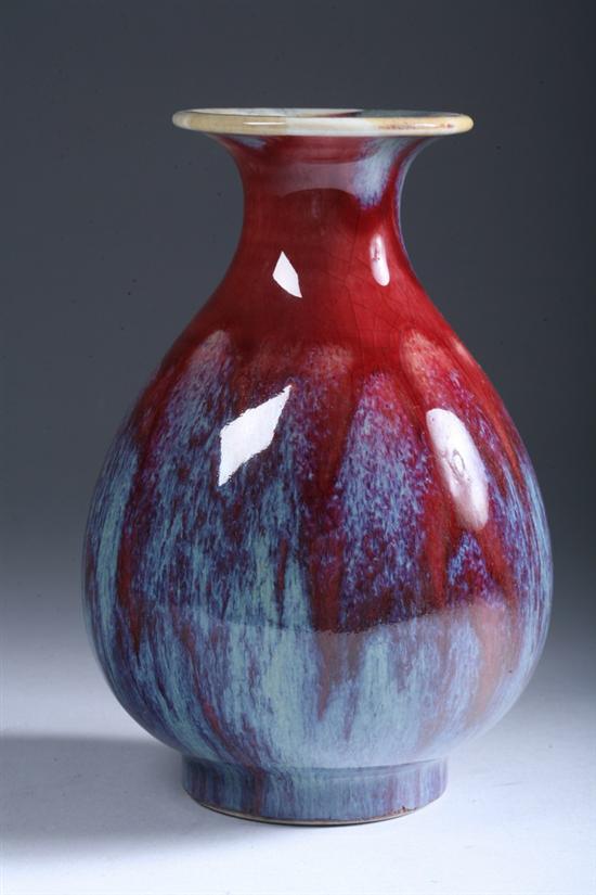 Appraisal: CHINESE FLAMB PORCELAIN VASE Qing Dynasty Pear-shaped with waisted neck